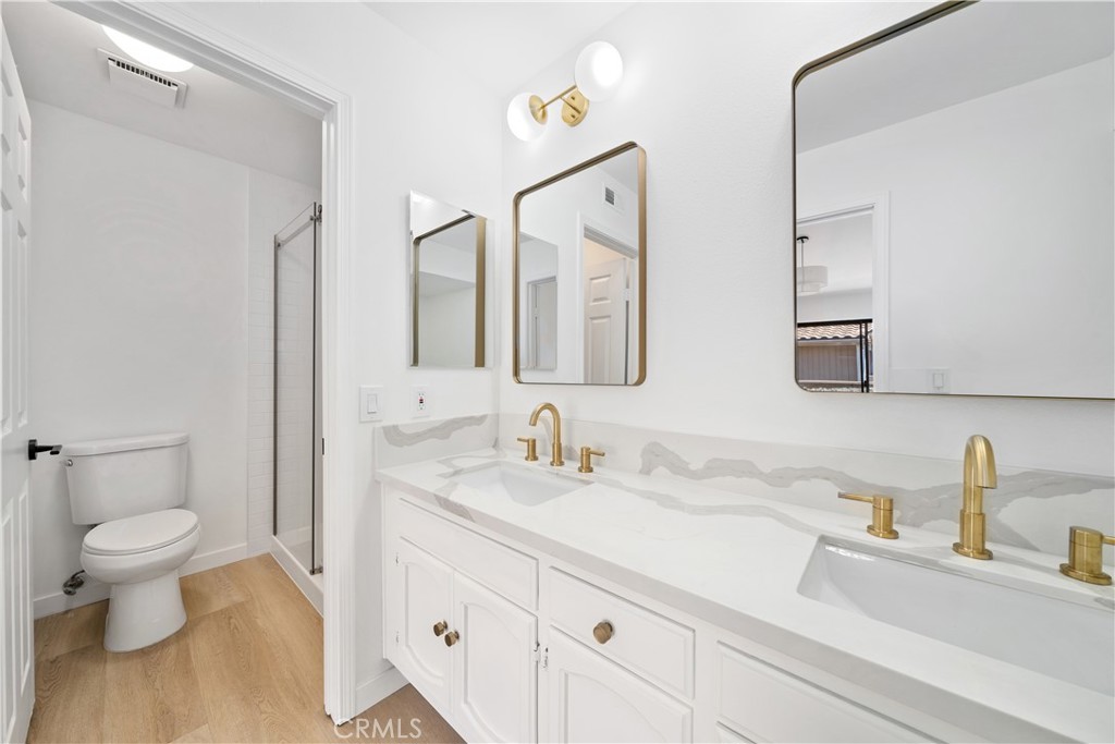 5510 Las Virgenes Road Calabasas, CA 91302 - Photo 7 of 16 a bathroom with a sink and a toilet