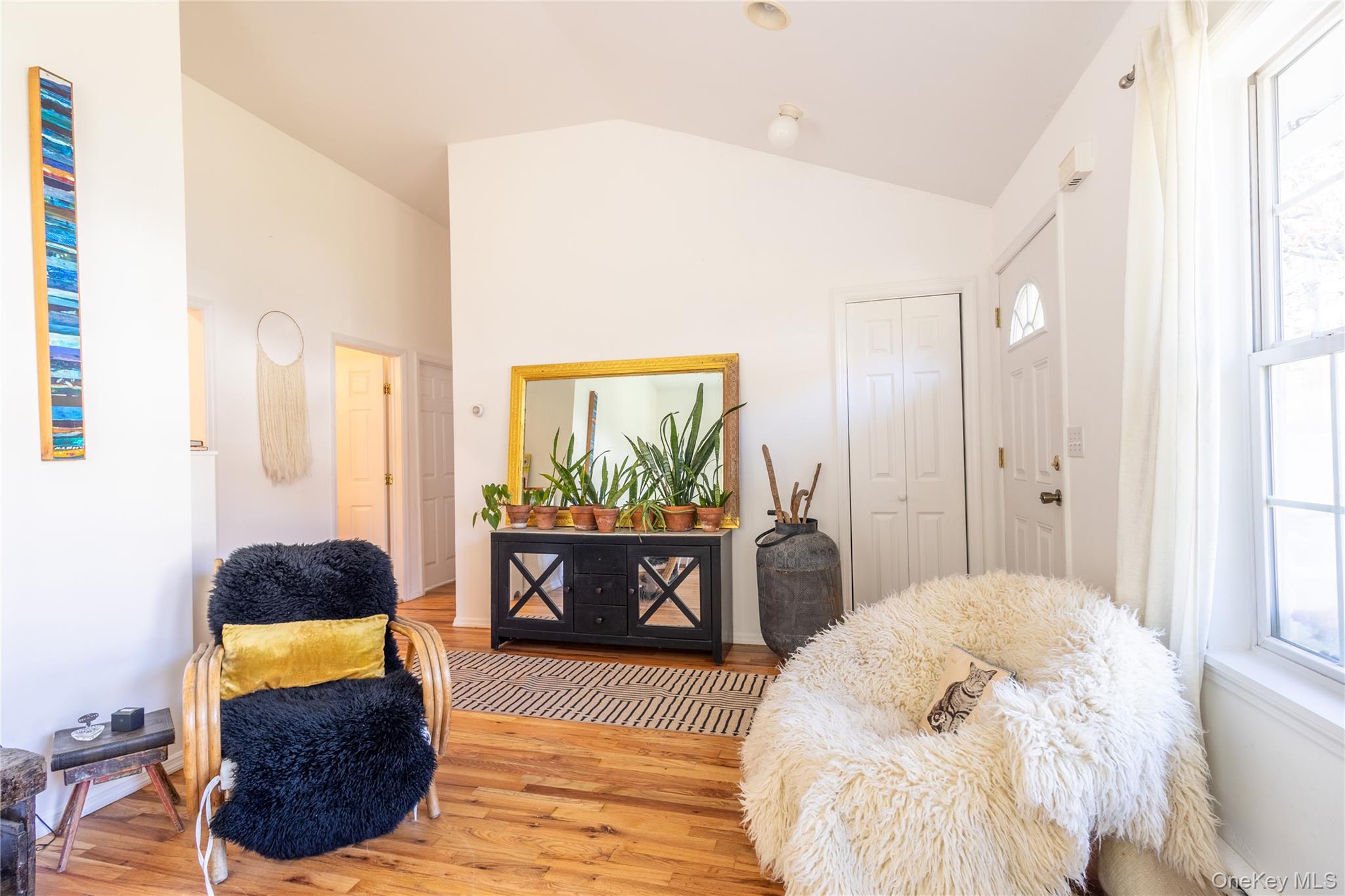 50 Prince Road Rocky Point, NY 11778 - Photo 7 of 30 a bedroom with a bed and window