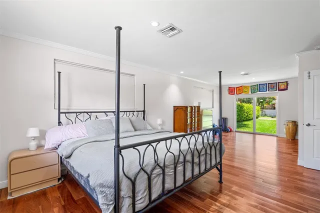 a bed room with furniture and a window