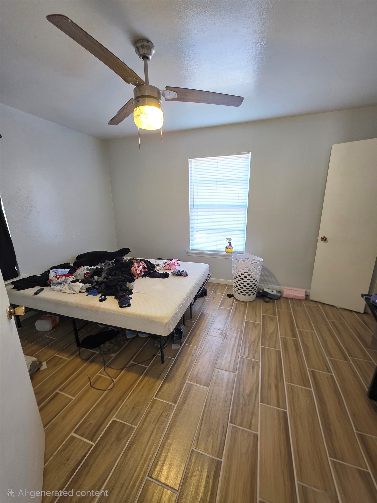 805 Sissom Road Killeen, TX 76541 - Photo 24 of 35 Bedroom featuring wood tiled floors and ceiling fan
