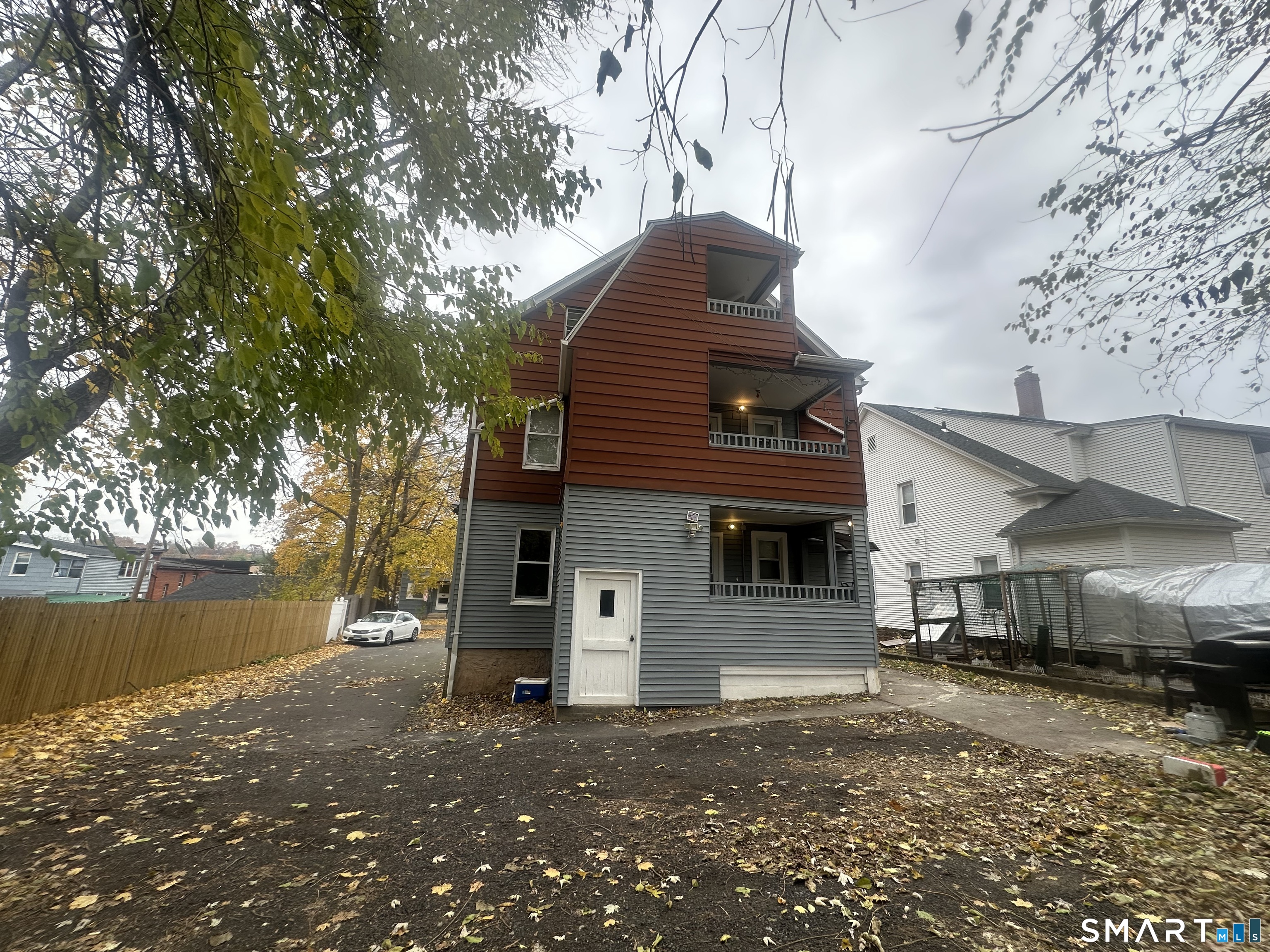 33 Emory Court Bristol, CT 06010 - Photo 2 of 11 a front view of a house with a yard