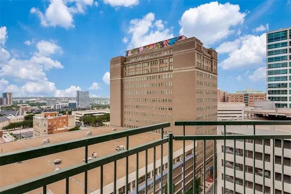 a view of a building from a balcony