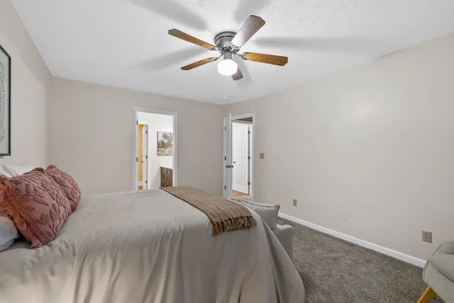 a bathroom with a tub shower view and a bathroom sink