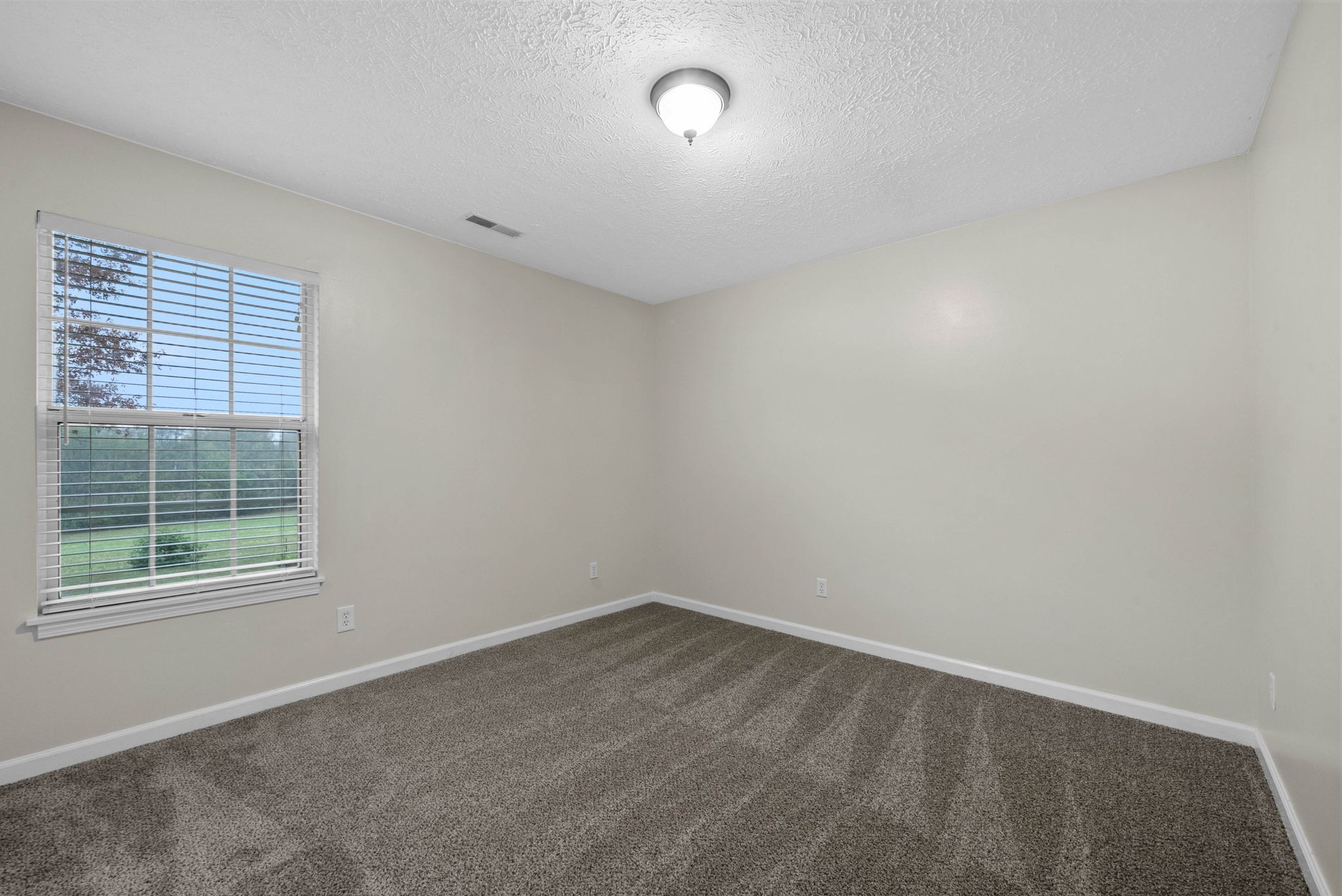 105 Good Hope Cemetery Road Oak Grove, KY 42262 - Photo 21 of 33 an empty room with a window