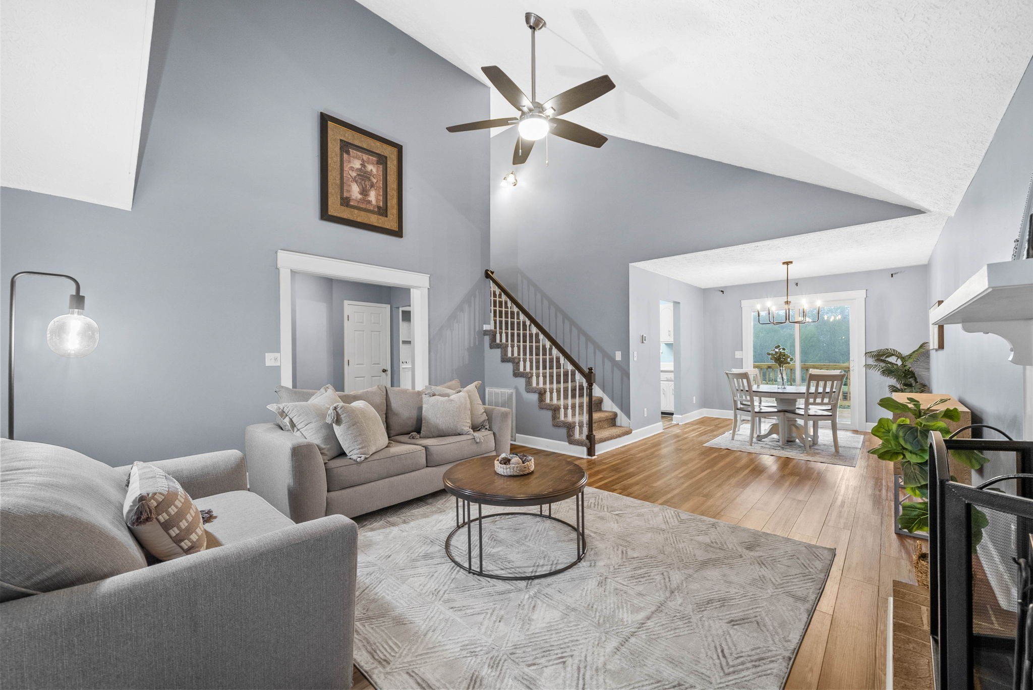 105 Good Hope Cemetery Road Oak Grove, KY 42262 - Photo 7 of 33 a living room with furniture potted plant and a large window