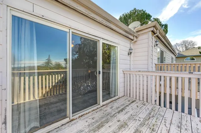 a view of a wooden fence from a balcony