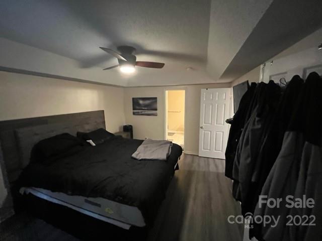 11047 Pointer Ridge Drive Charlotte, NC 28214 - Photo 13 of 26 a bed sitting in a bedroom next to a window