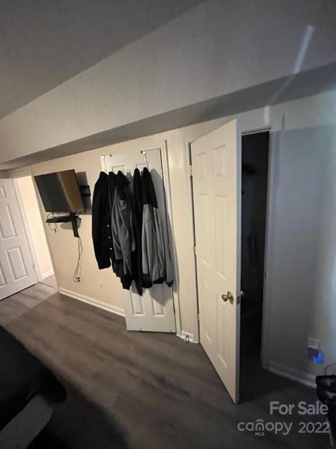 11047 Pointer Ridge Drive Charlotte, NC 28214 - Photo 15 of 26 a view of walk in closet with clothes and shoes