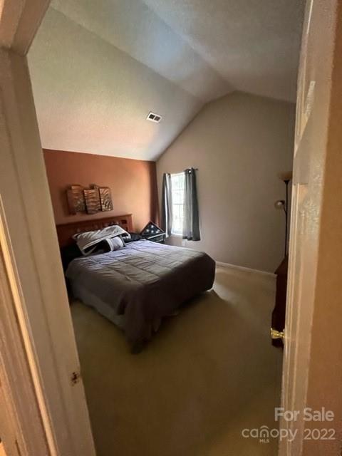 11047 Pointer Ridge Drive Charlotte, NC 28214 - Photo 18 of 26 a bedroom with a bed and window