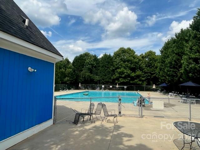 11047 Pointer Ridge Drive Charlotte, NC 28214 - Photo 25 of 26 a view of a terrace with a yard