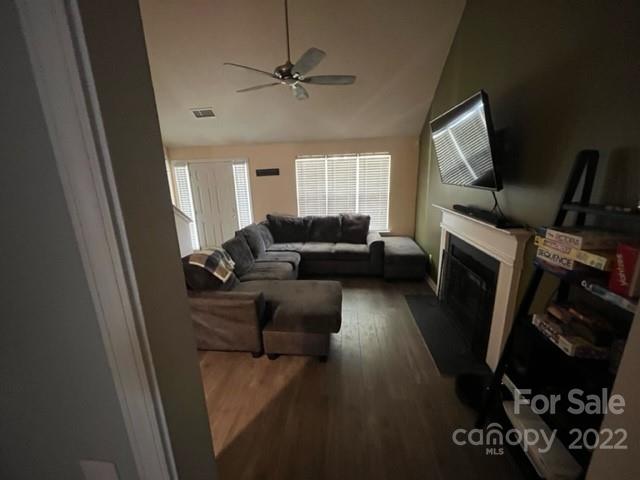 11047 Pointer Ridge Drive Charlotte, NC 28214 - Photo 5 of 26 a living room with furniture and a flat screen tv