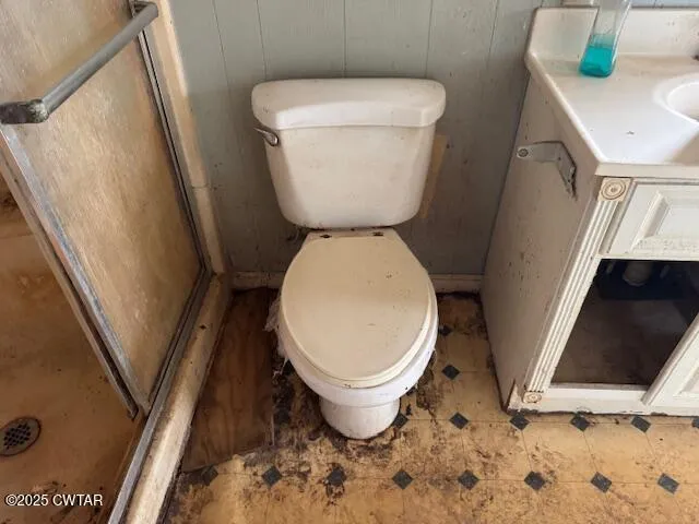 a bathroom with a toilet and a sink