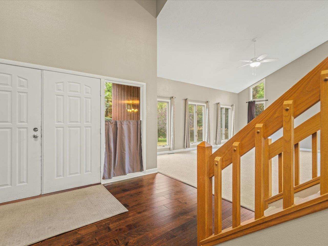 9104 East Weber Road Ridott, IL 61067 - Photo 15 of 96 a view of an entryway with wooden floor and stairs