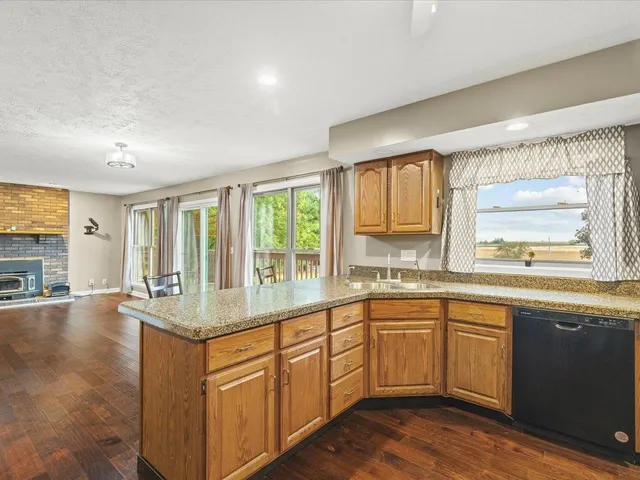 a view of a balcony with wooden floor