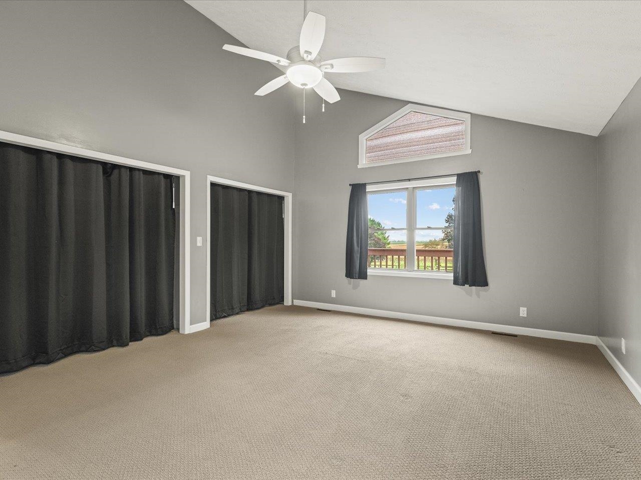 9104 East Weber Road Ridott, IL 61067 - Photo 30 of 96 a view of an empty room with a window