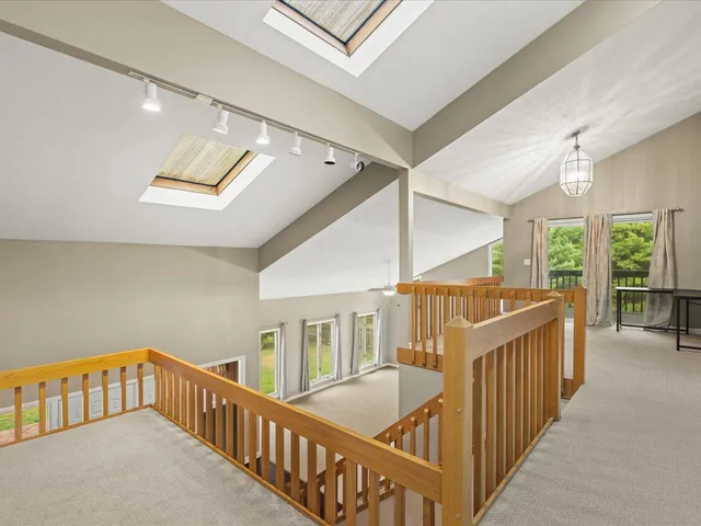 a kitchen with granite countertop cabinets stainless steel appliances and a sink