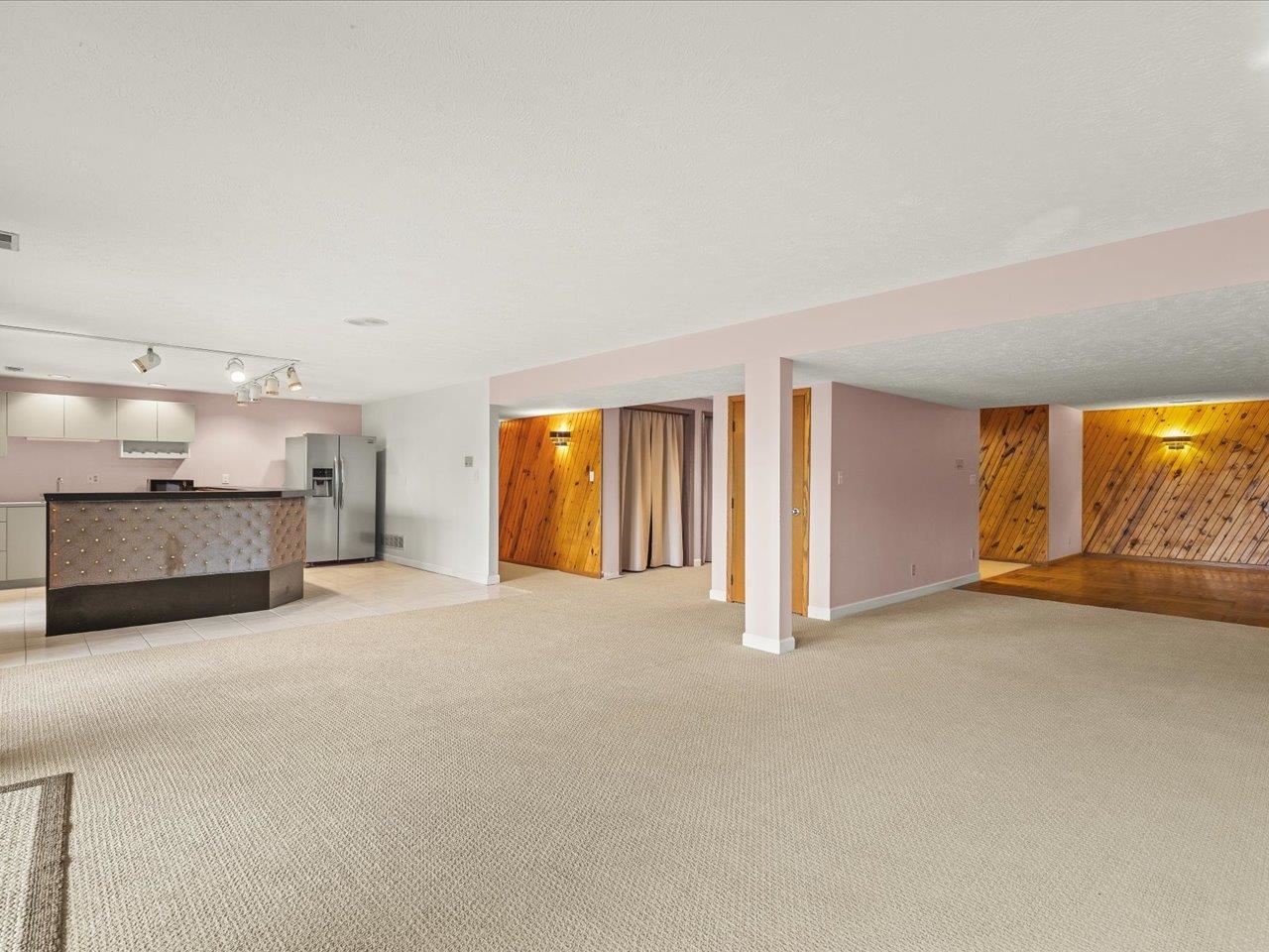 9104 East Weber Road Ridott, IL 61067 - Photo 42 of 96 a view of an empty room with a window and kitchen view
