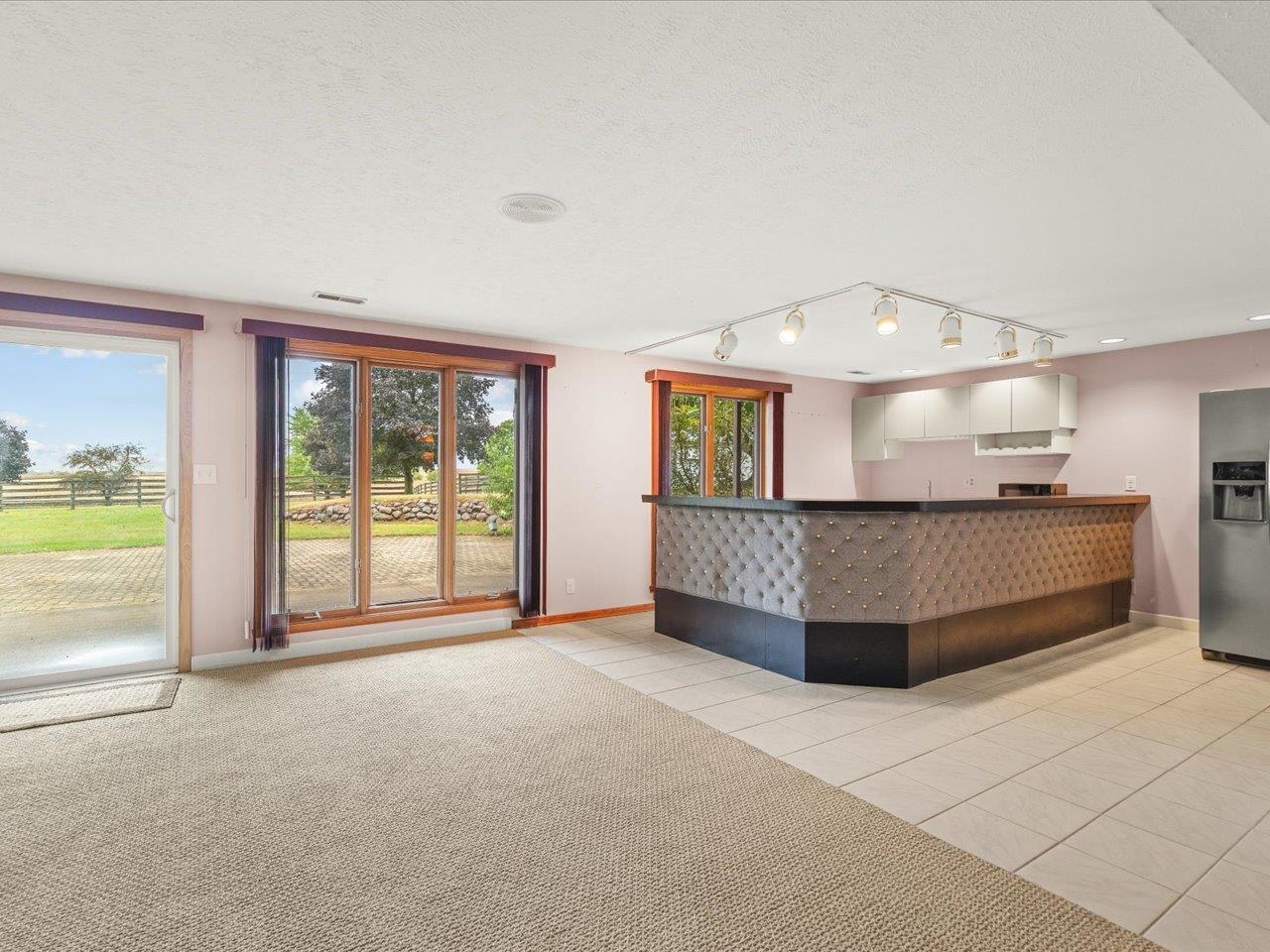 9104 East Weber Road Ridott, IL 61067 - Photo 43 of 96 a living room with furniture and a large window