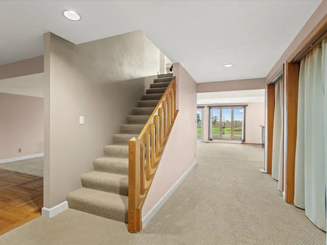 a view of a garden with a building in the background