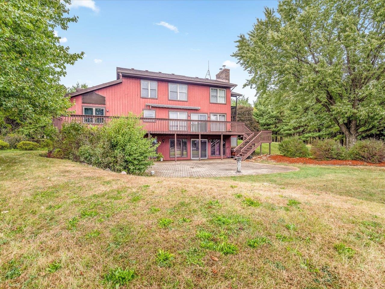 9104 East Weber Road Ridott, IL 61067 - Photo 56 of 96 a view of a house with pool and sitting area