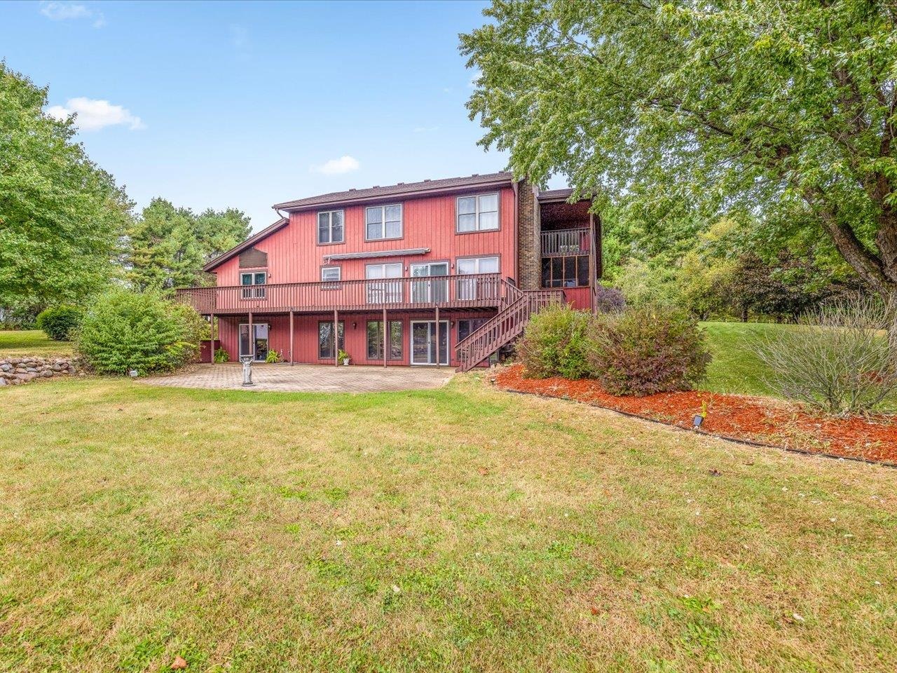 9104 East Weber Road Ridott, IL 61067 - Photo 59 of 96 front view of a house with a big yard