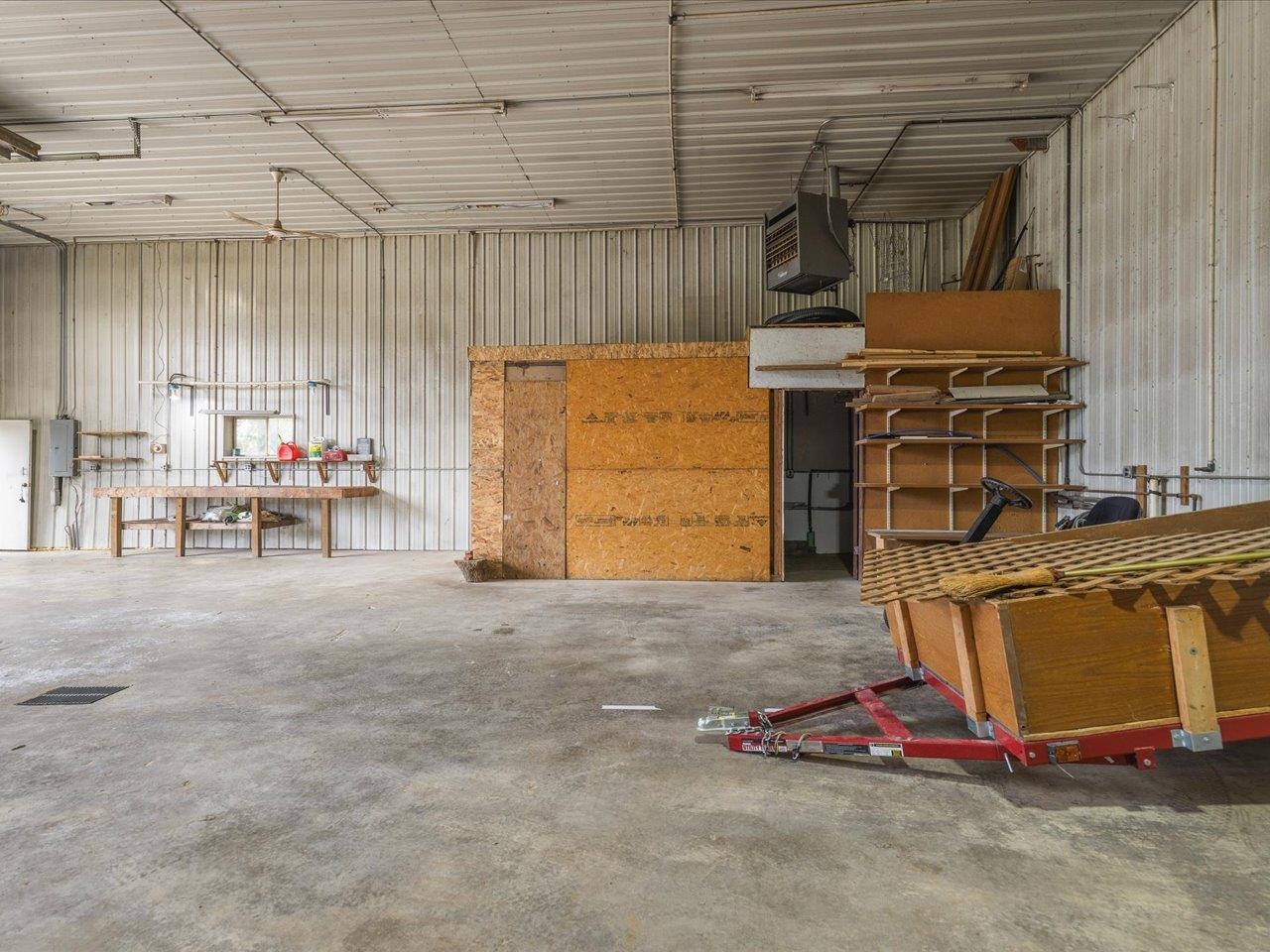 9104 East Weber Road Ridott, IL 61067 - Photo 67 of 96 a room with gym equipment and a window