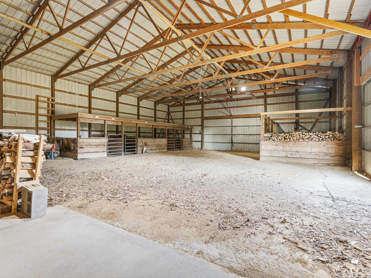 9104 East Weber Road Ridott, IL 61067 - Photo 68 of 96 a view of a garage with wooden floor