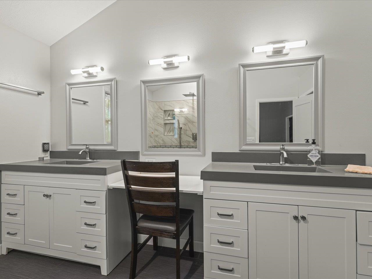 9104 East Weber Road Ridott, IL 61067 - Photo 77 of 96 a bathroom with a granite countertop sink and a mirror