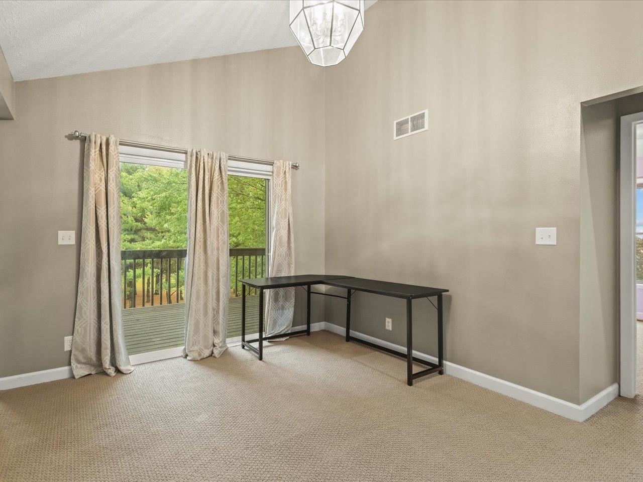 9104 East Weber Road Ridott, IL 61067 - Photo 82 of 96 a view of an empty room with a window