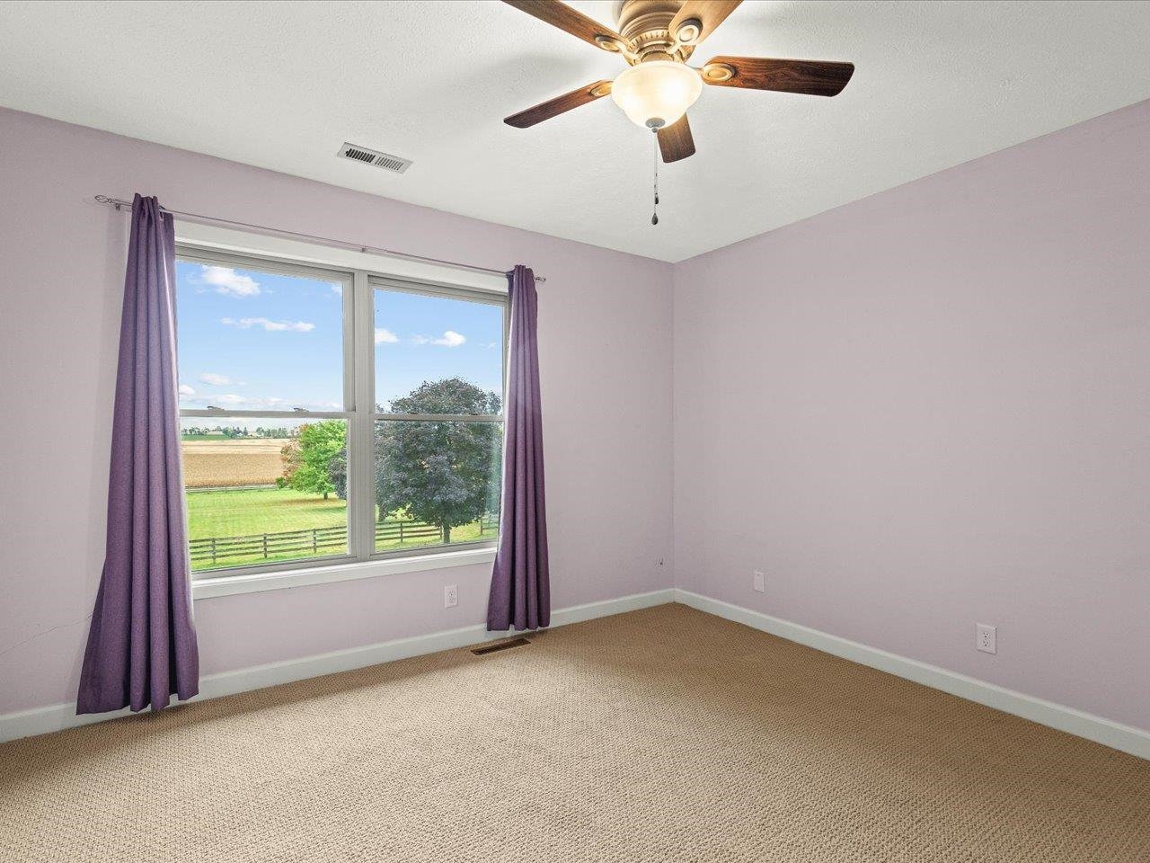 9104 East Weber Road Ridott, IL 61067 - Photo 86 of 96 an empty room with a window