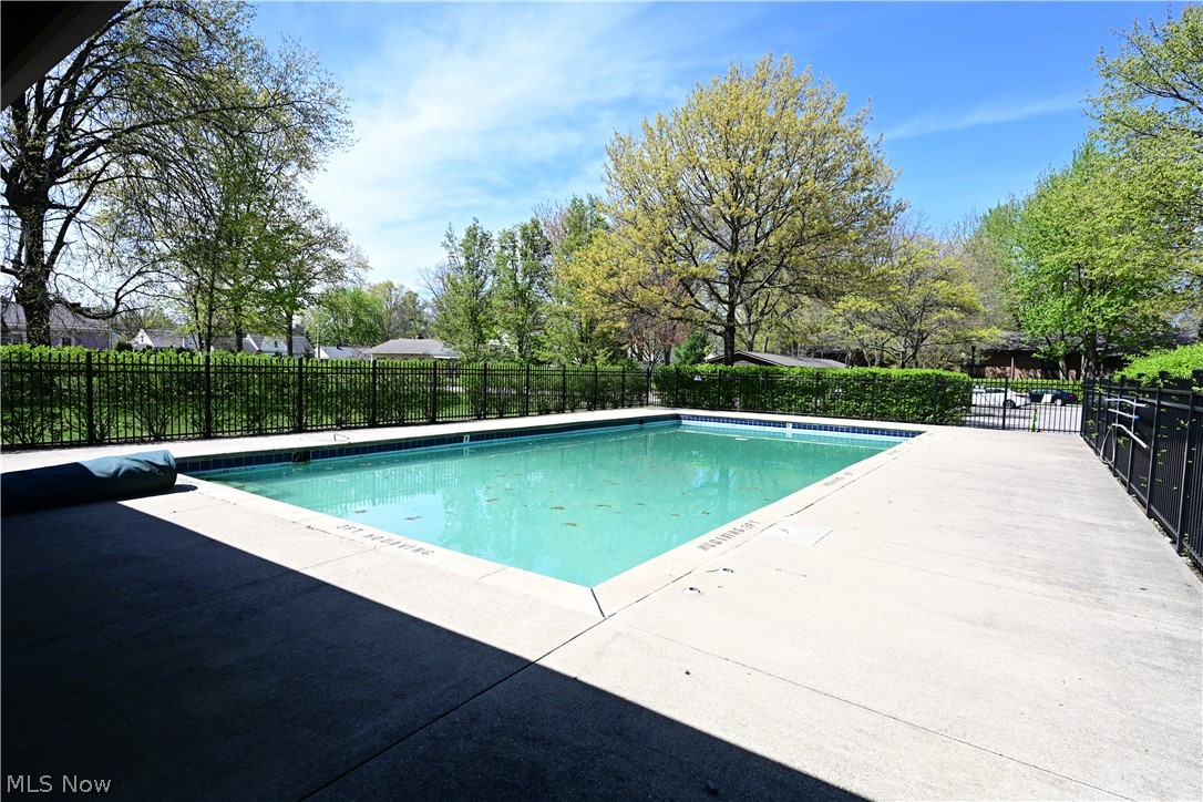 22962 Maple Ridge Road, Unit 108 North Olmsted, OH 44070 - Photo 35 of 37 View of pool featuring a patio