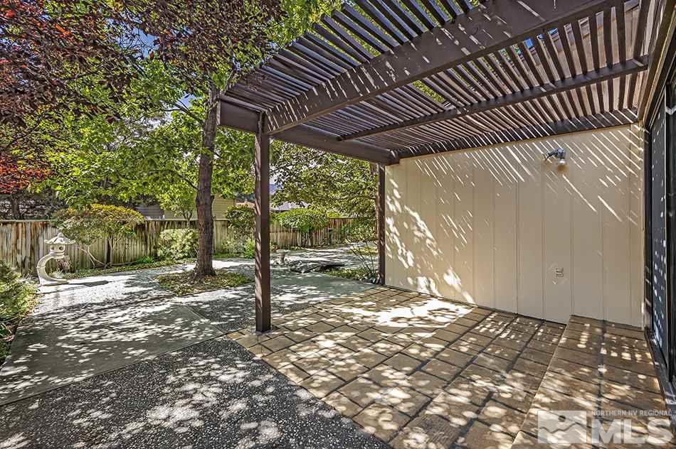 1600 Foster Drive Reno, NV 89509 - Photo 19 of 22 a view of a backyard with wooden fence