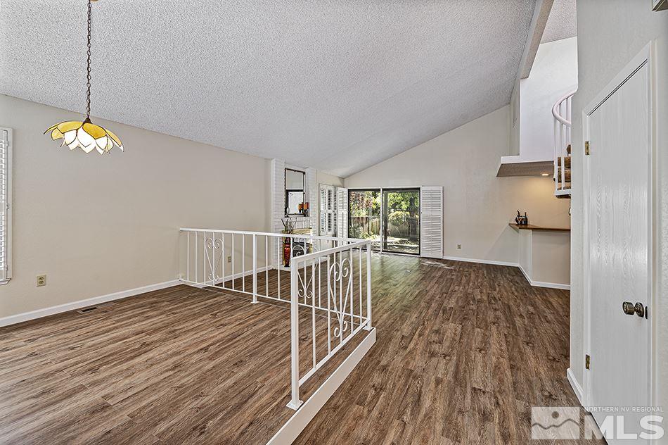 1600 Foster Drive Reno, NV 89509 - Photo 2 of 22 a view of a bedroom with wooden floor