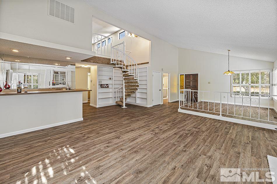 1600 Foster Drive Reno, NV 89509 - Photo 5 of 22 a view of a kitchen with wooden floor and a window