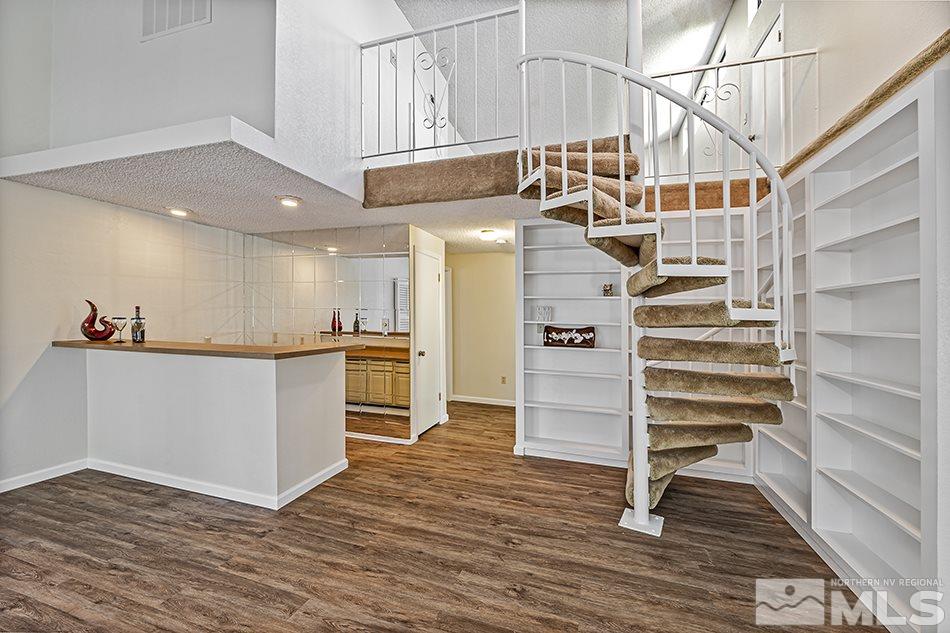 1600 Foster Drive Reno, NV 89509 - Photo 7 of 22 a view of entryway and kitchen with wooden floor