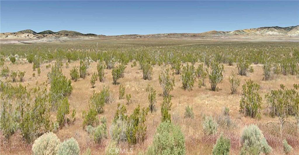 64 Sunset Avenue Mojave, CA 93501 - Photo 3 of 7 a view of lake and mountain