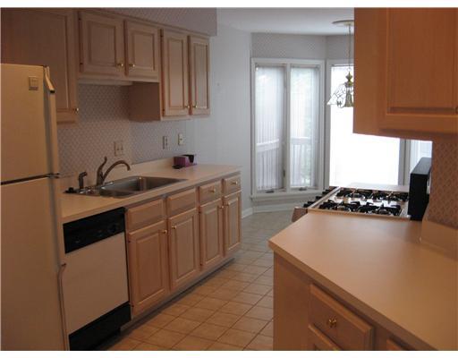 164 Shadow Ridge Drive Pittsburgh, PA 15238 - Photo 7 of 18 Kitchen. TILED FLOOR-EATING AREA OVERLOOKING WOODS