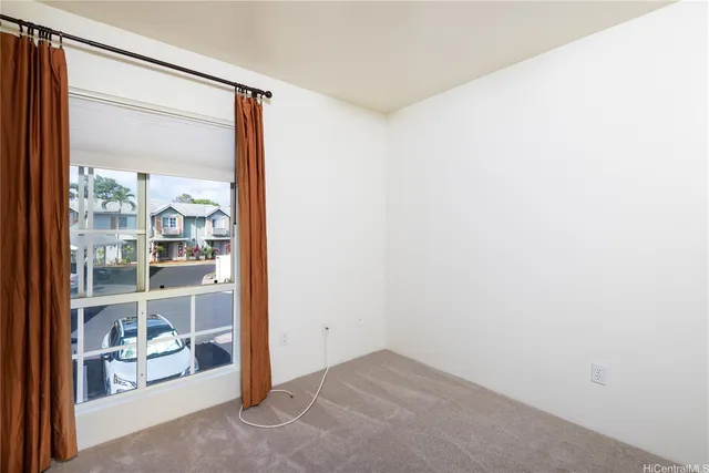 a view of a room with a large window