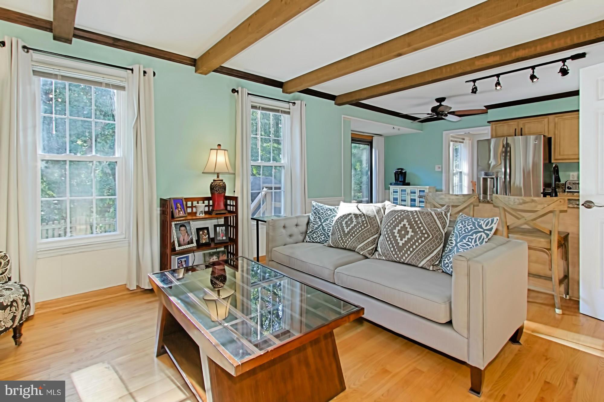 10041 Marshall Pond Road Burke, VA 22015 - Photo 11 of 30 Bright Family Room w/ rustic beams & gas fireplace