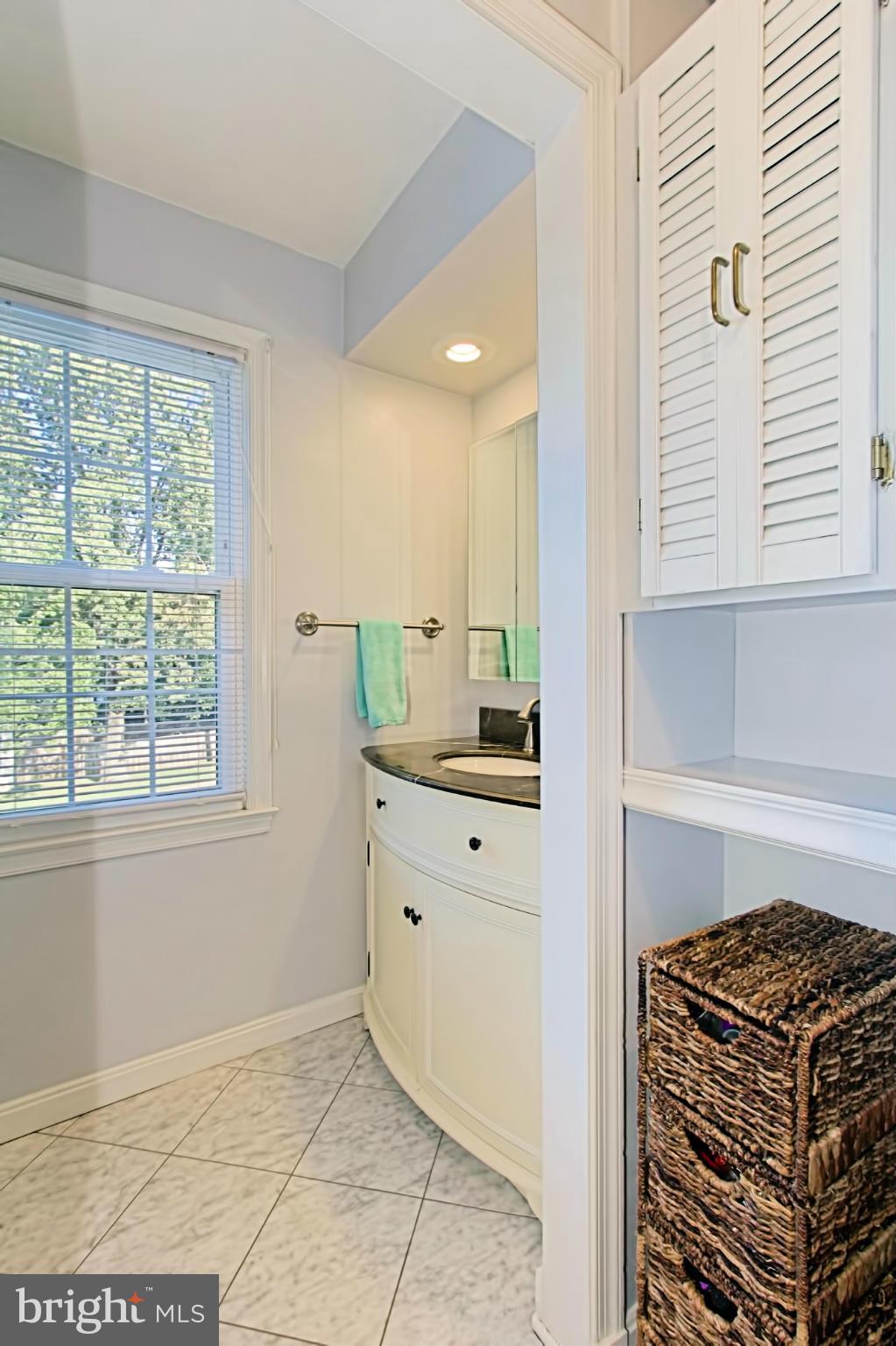 10041 Marshall Pond Road Burke, VA 22015 - Photo 20 of 30 Updated Upper Hall Bath is sure to please