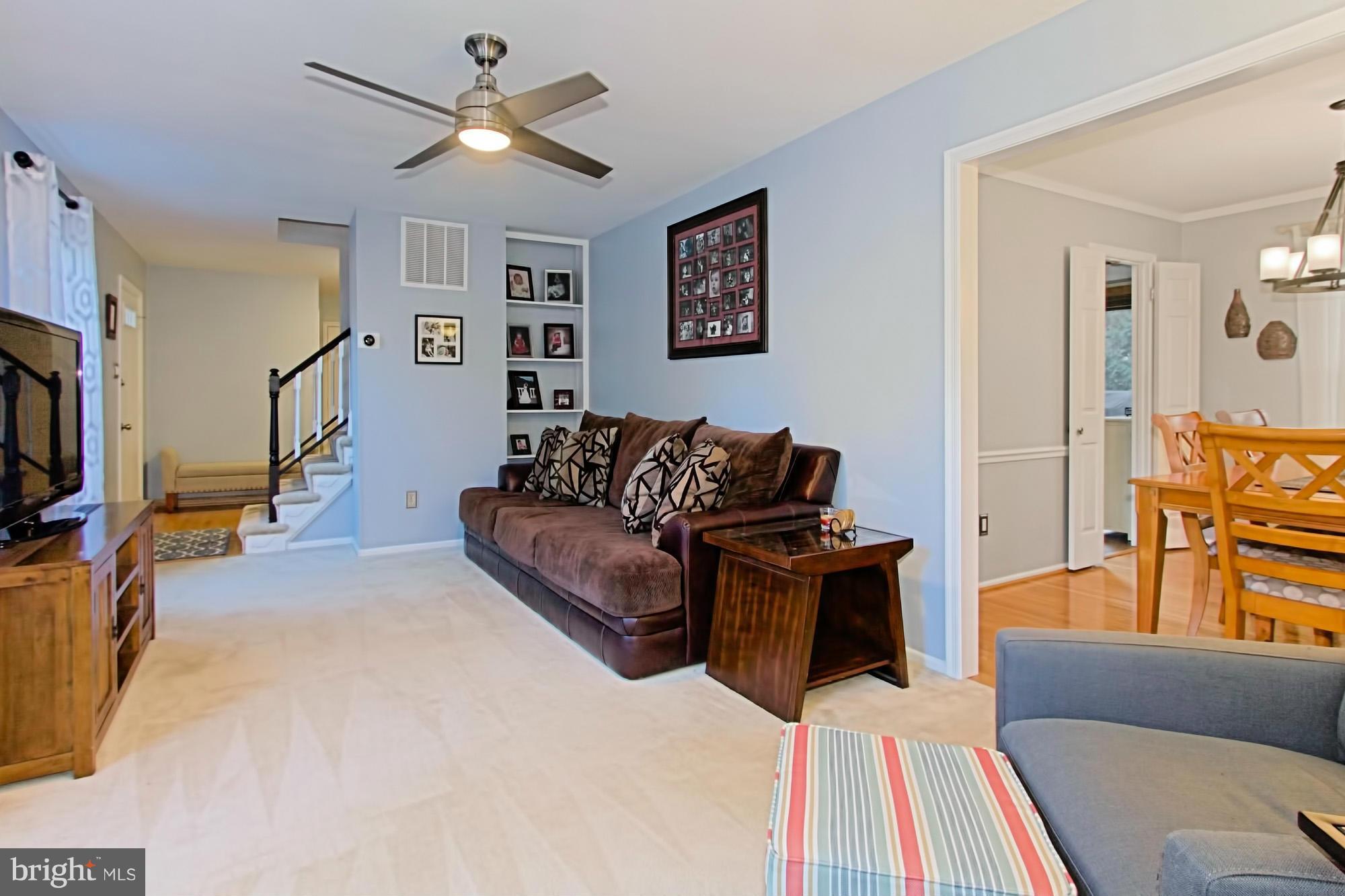 10041 Marshall Pond Road Burke, VA 22015 - Photo 5 of 30 Built-in shelving & updated ceiling fan in the LR
