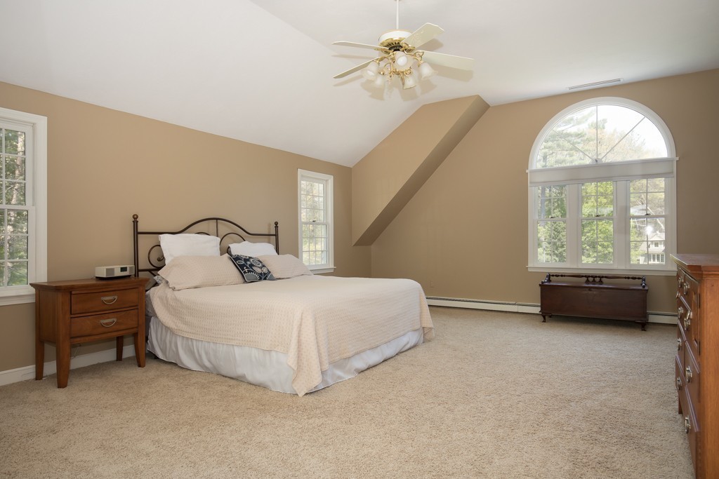 6 Leclair Drive Hingham, MA 02043 - Photo 15 of 26 a bedroom with a bed and a large window
