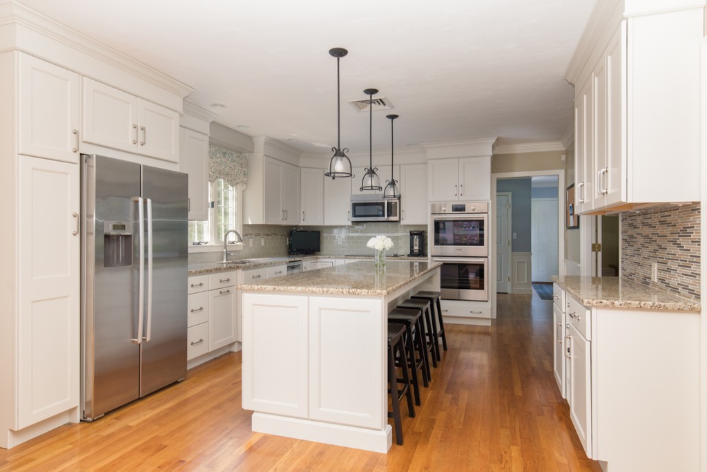 6 Leclair Drive Hingham, MA 02043 - Photo 5 of 26 a kitchen with kitchen island a counter top space a sink appliances and cabinets