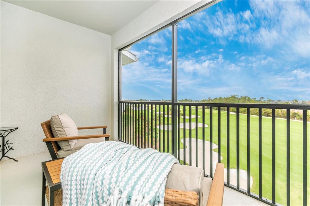12280 Wellen Golf Street, Unit 403 Venice, FL 34293 - Photo 21 of 97 a bedroom with a bed and a window