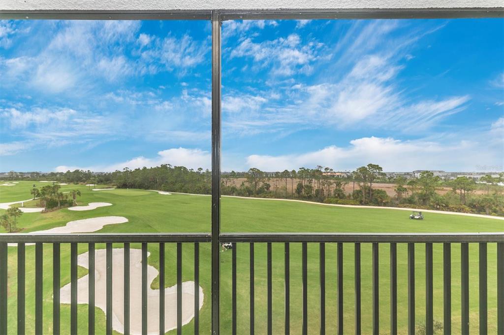 12280 Wellen Golf Street, Unit 403 Venice, FL 34293 - Photo 23 of 97 a view of city and mountain from a balcony