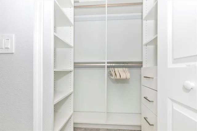 a view of an apartment with a swimming pool