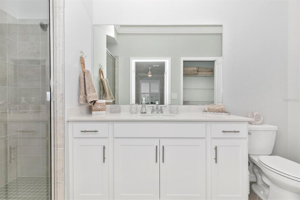 12280 Wellen Golf Street, Unit 403 Venice, FL 34293 - Photo 32 of 97 a bathroom with a sink and a toilet