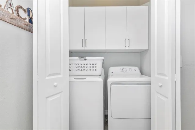 a view of a house with backyard porch and sitting area