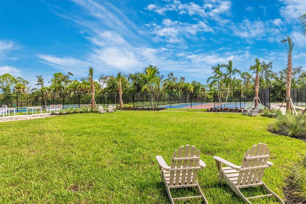 12280 Wellen Golf Street, Unit 403 Venice, FL 34293 - Photo 51 of 97 a view of a park with large trees