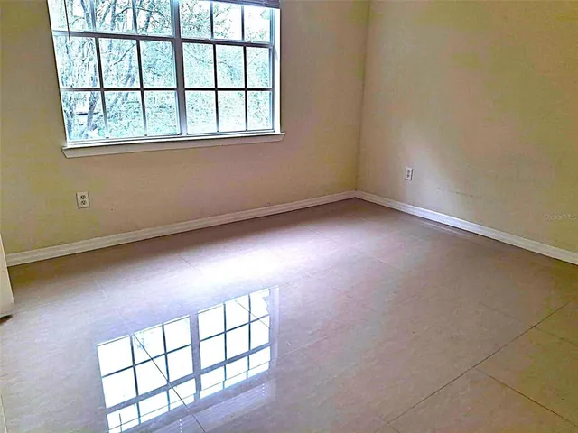 an empty room with windows